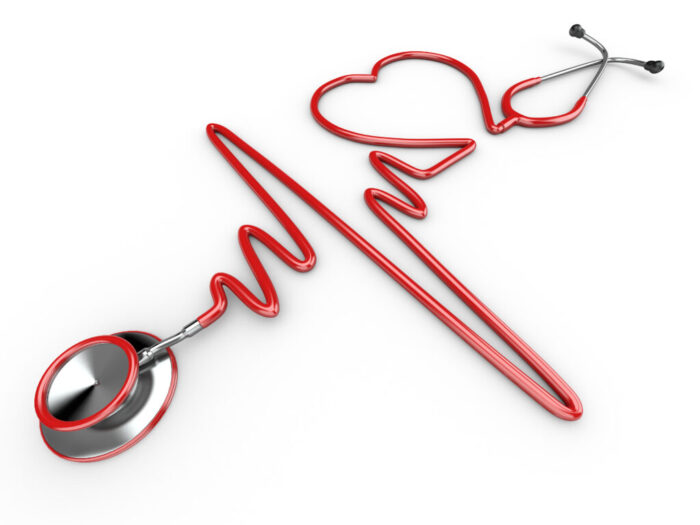 Stethoscope and a silhouette of the heart and ECG
